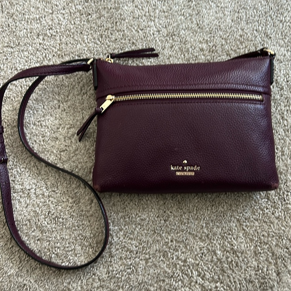 Purple Kate spade crossbody purse